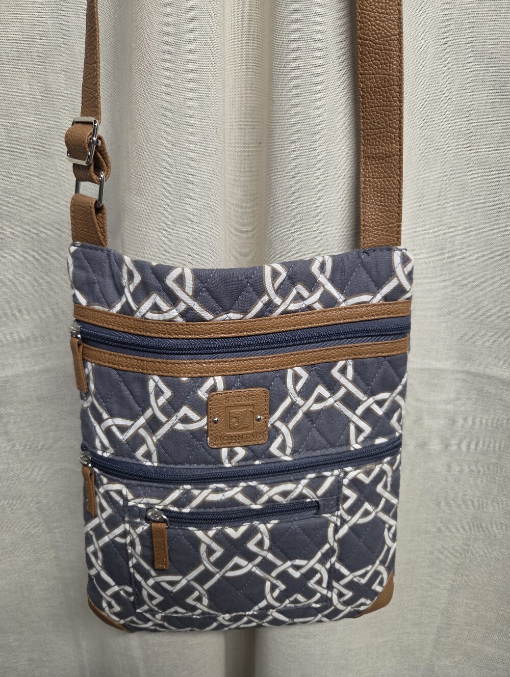 Stone Mountain Navy Quilted Crossbody with White Geometric Print and Brown Trim